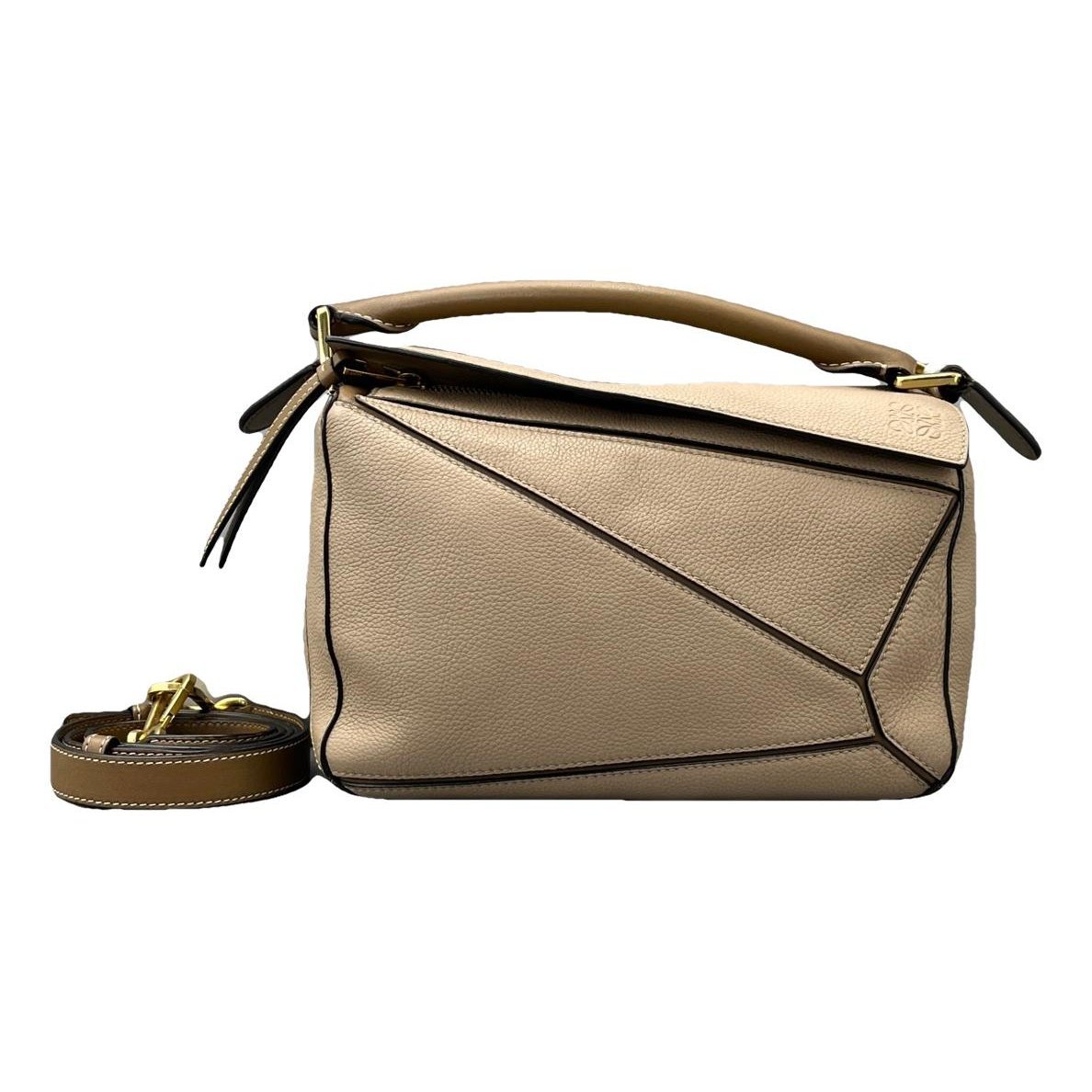 Puzzle leather handbag