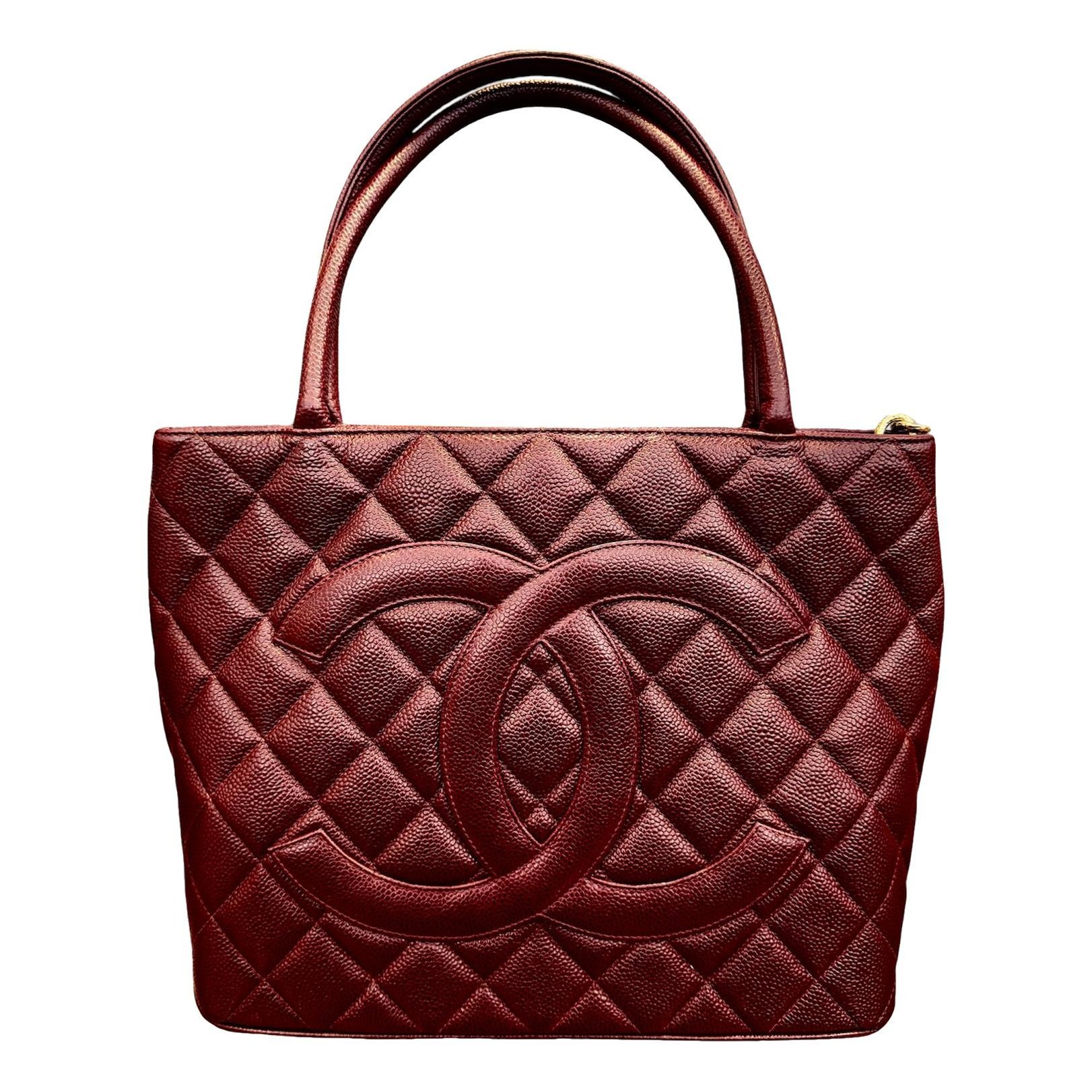 Médaillon leather handbag