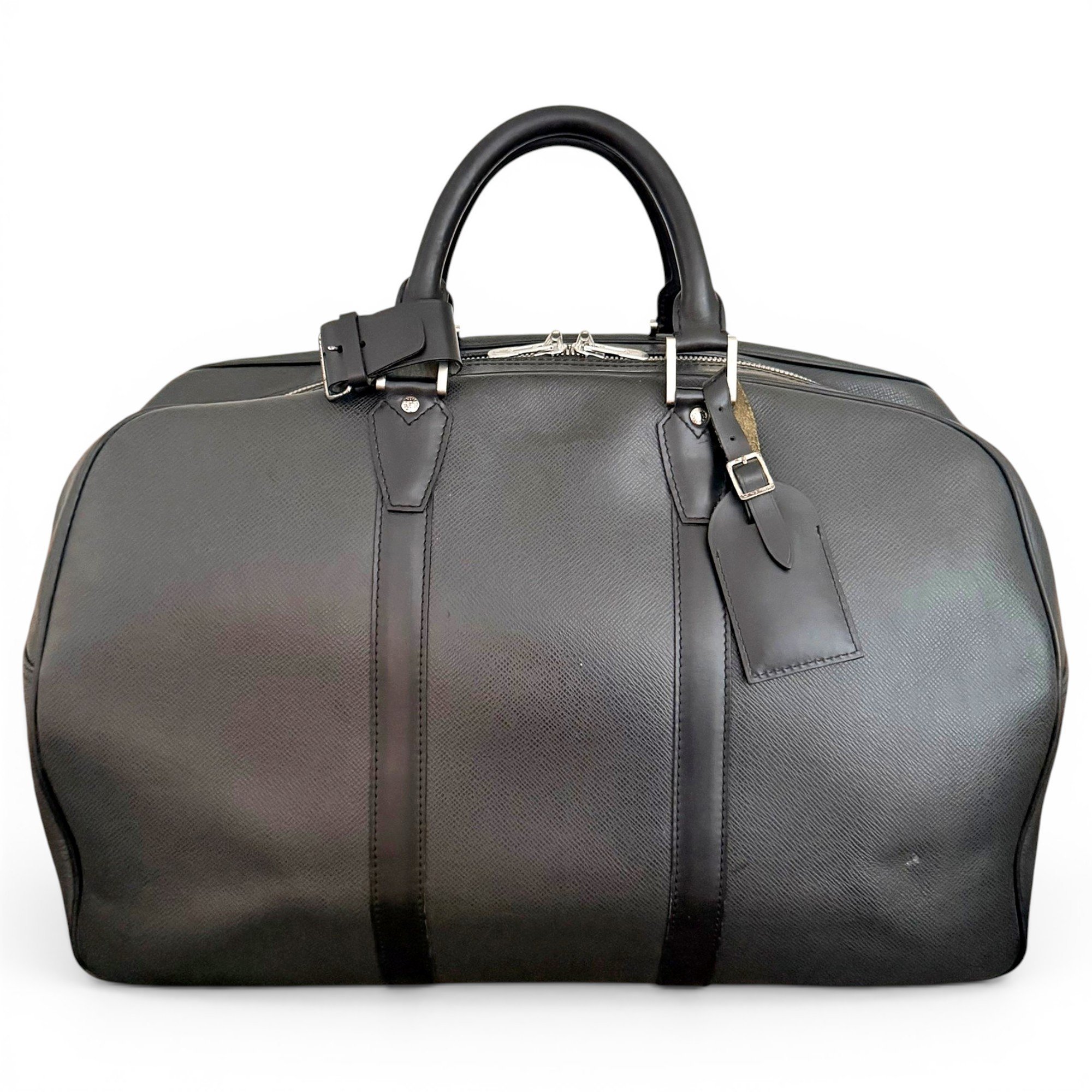 Patent leather travel bag