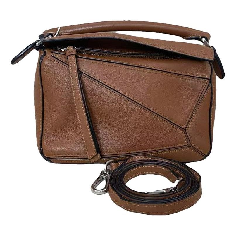 Puzzle leather handbag