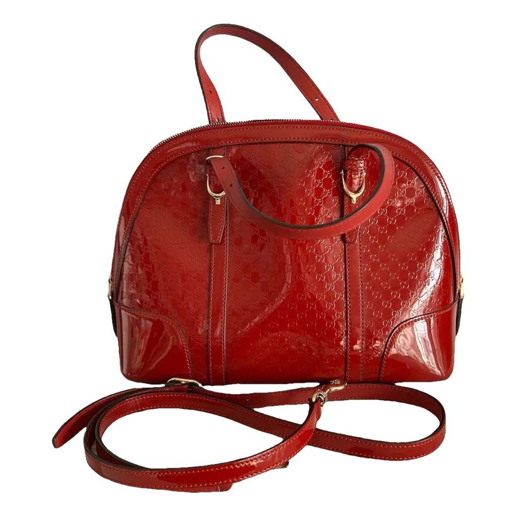 Dôme patent leather handbag