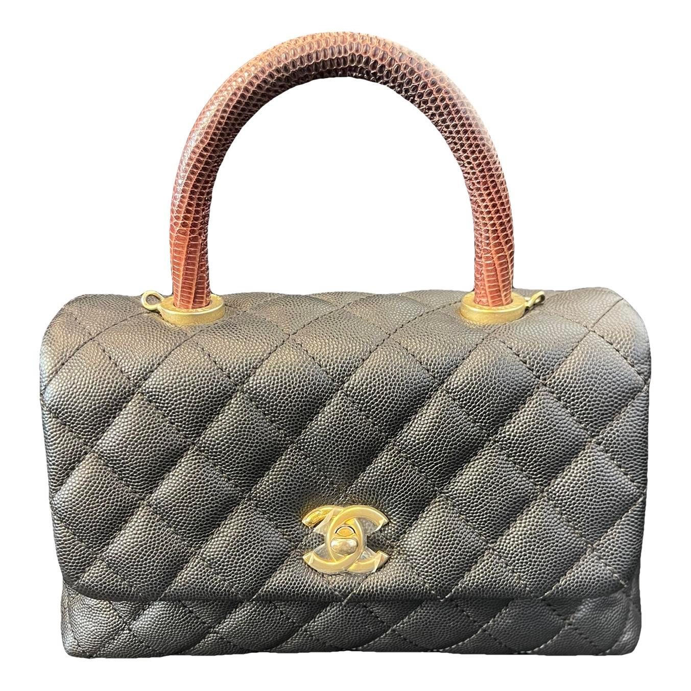 Timeless Classique Top Handle leather handbag