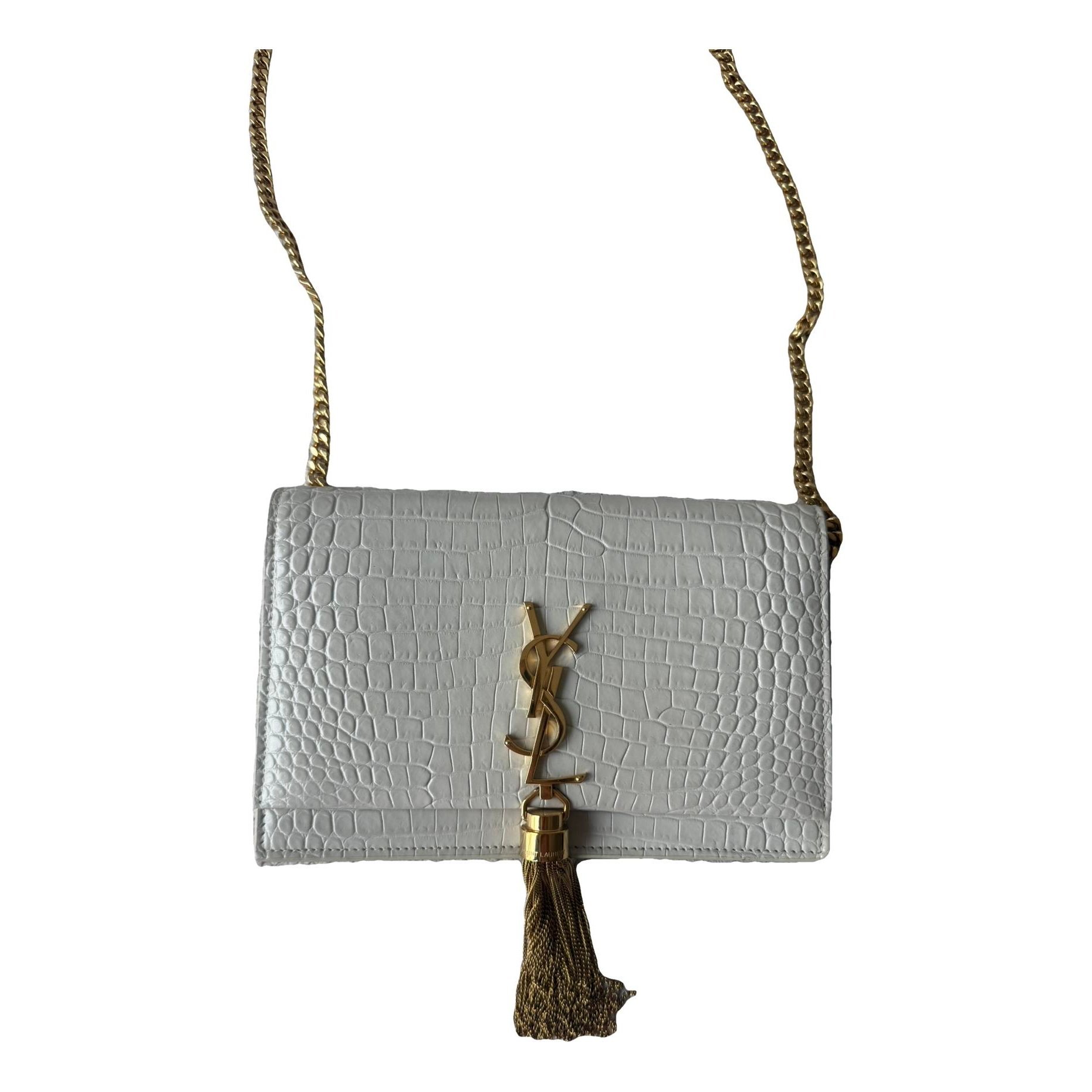 Kate monogramme leather clutch bag