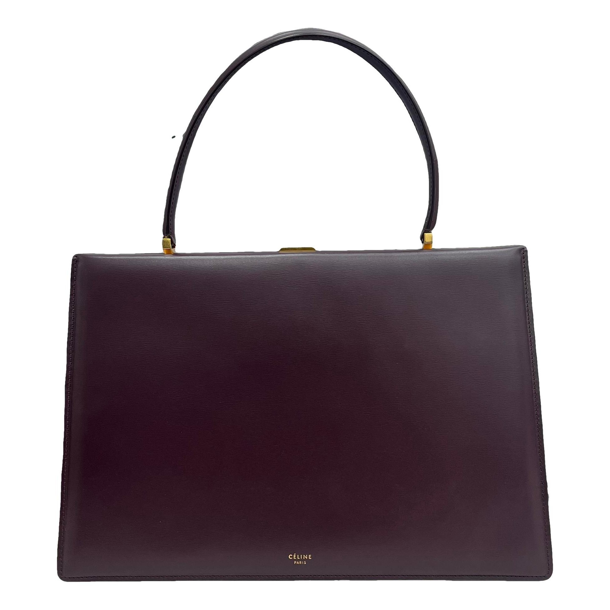 Clasp leather handbag
