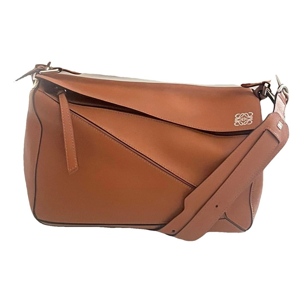 Puzzle leather handbag