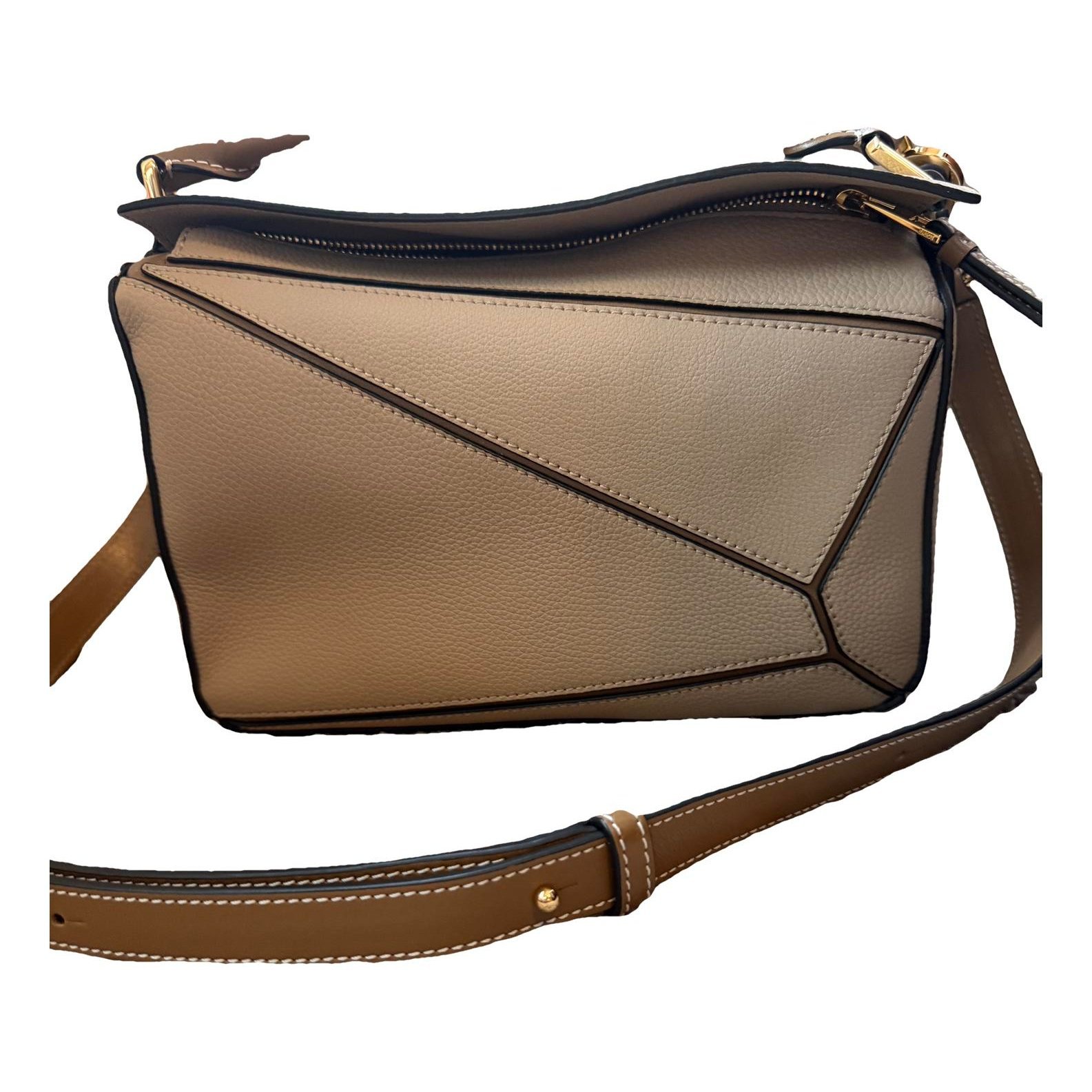 Puzzle leather handbag