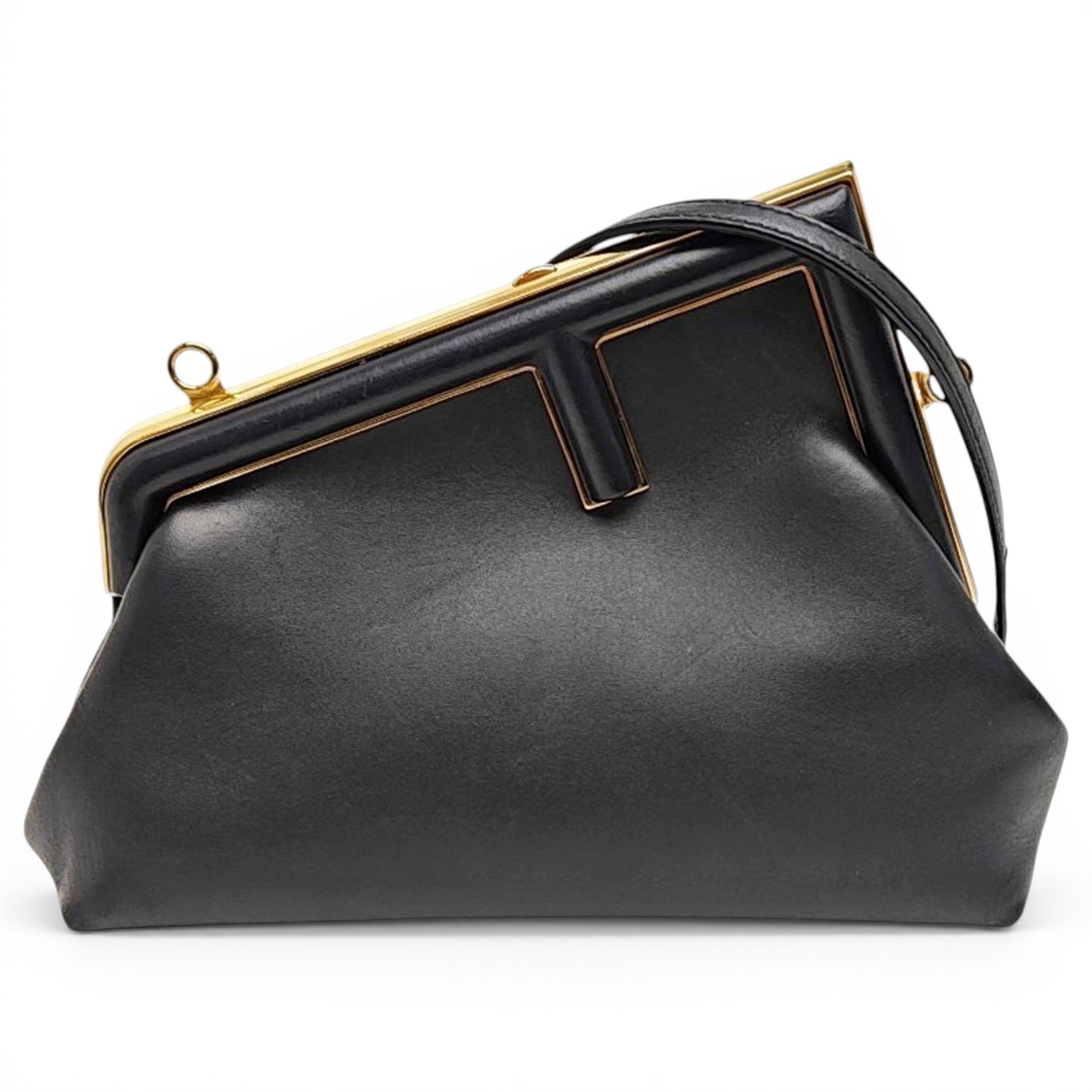 First leather handbag