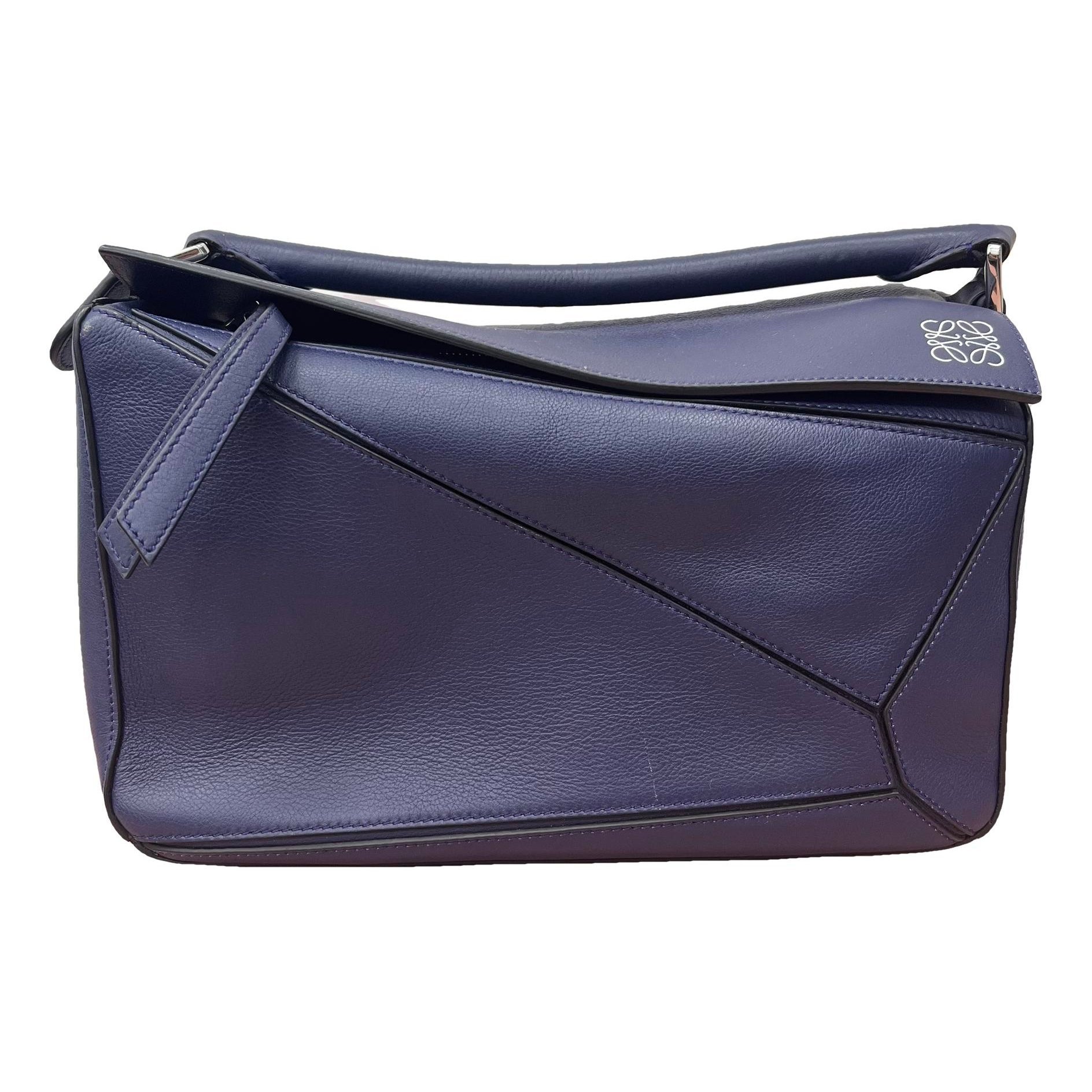 Puzzle leather handbag