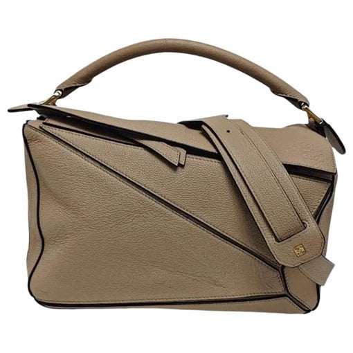 Puzzle leather handbag