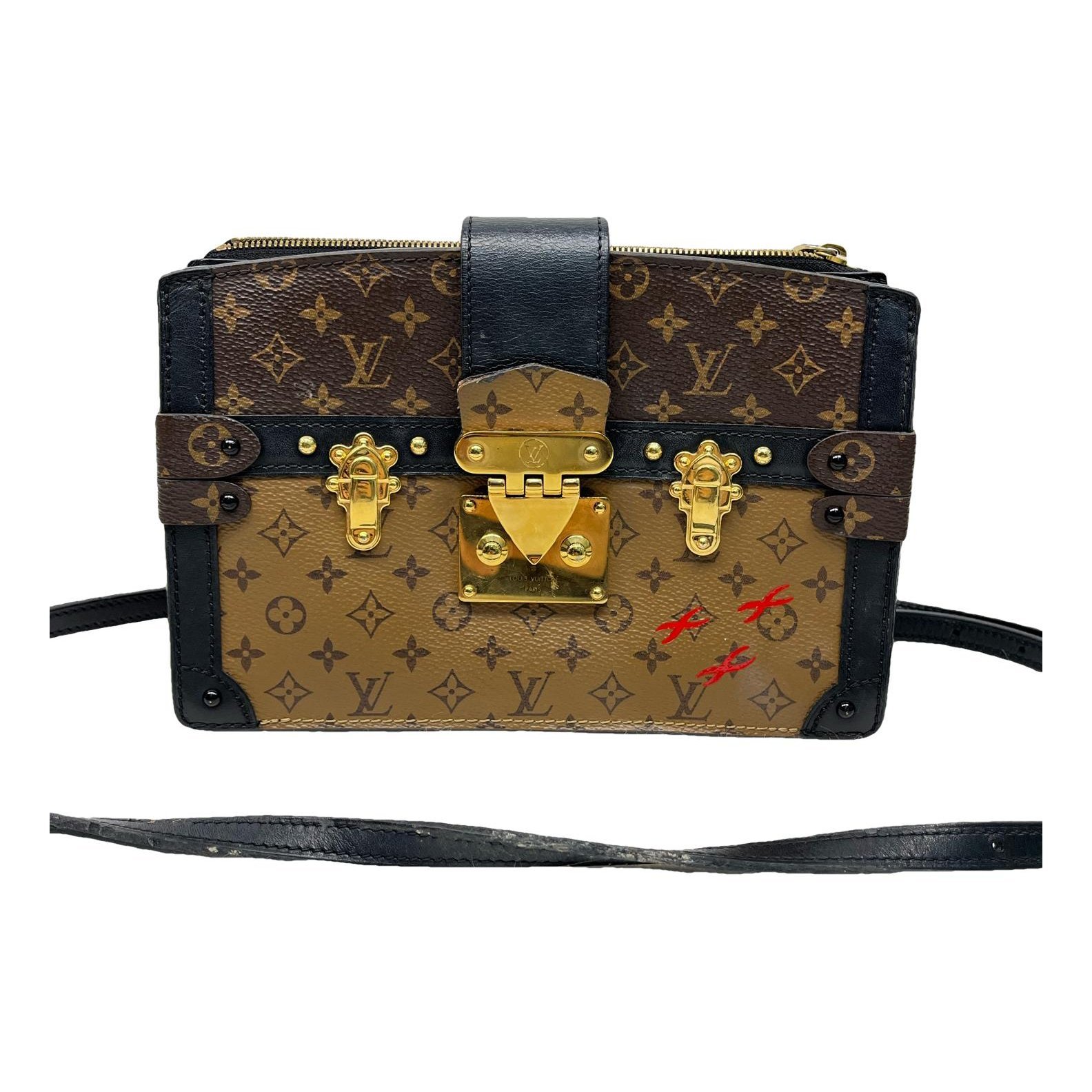 Pochette Trunk leather handbag