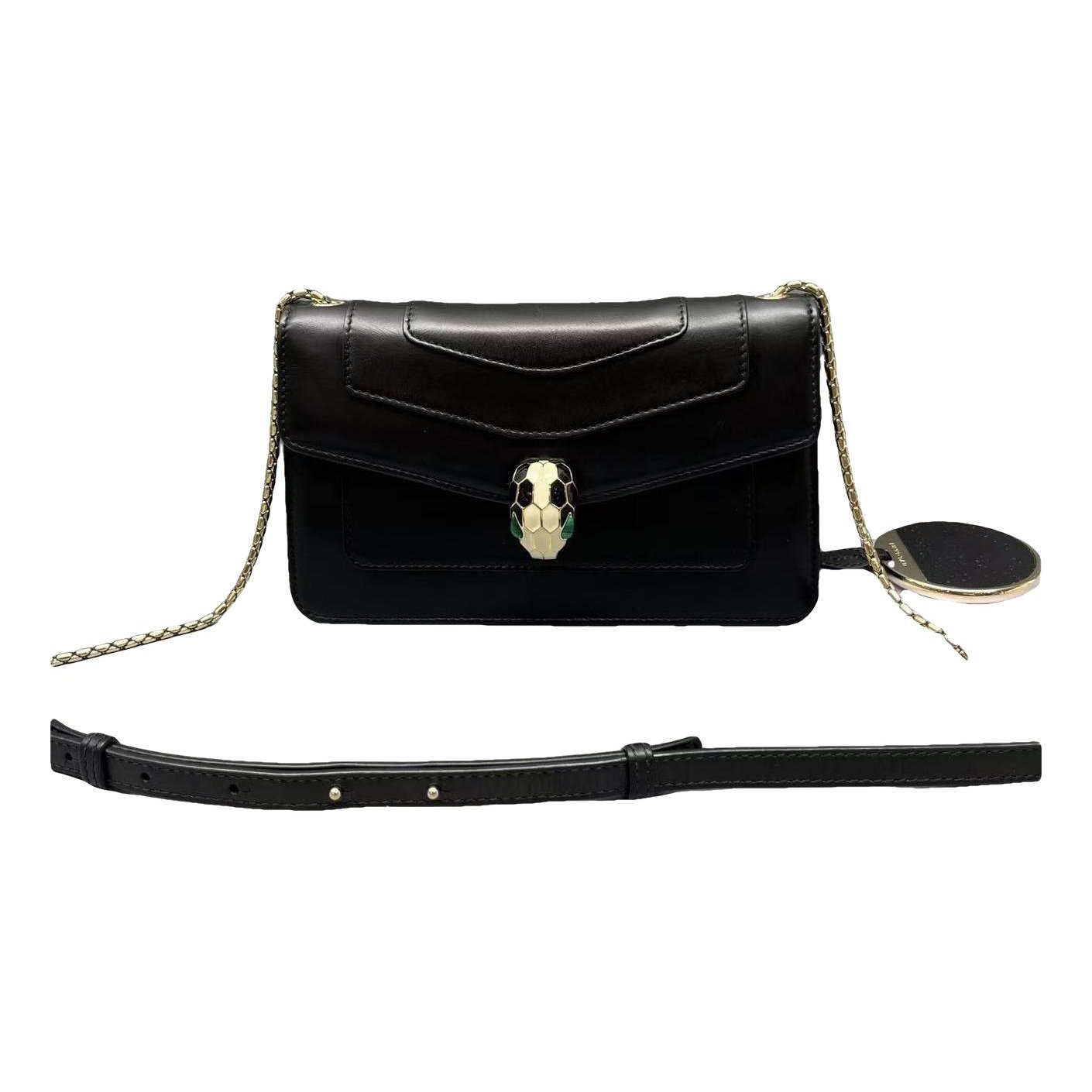 Serpenti leather handbag