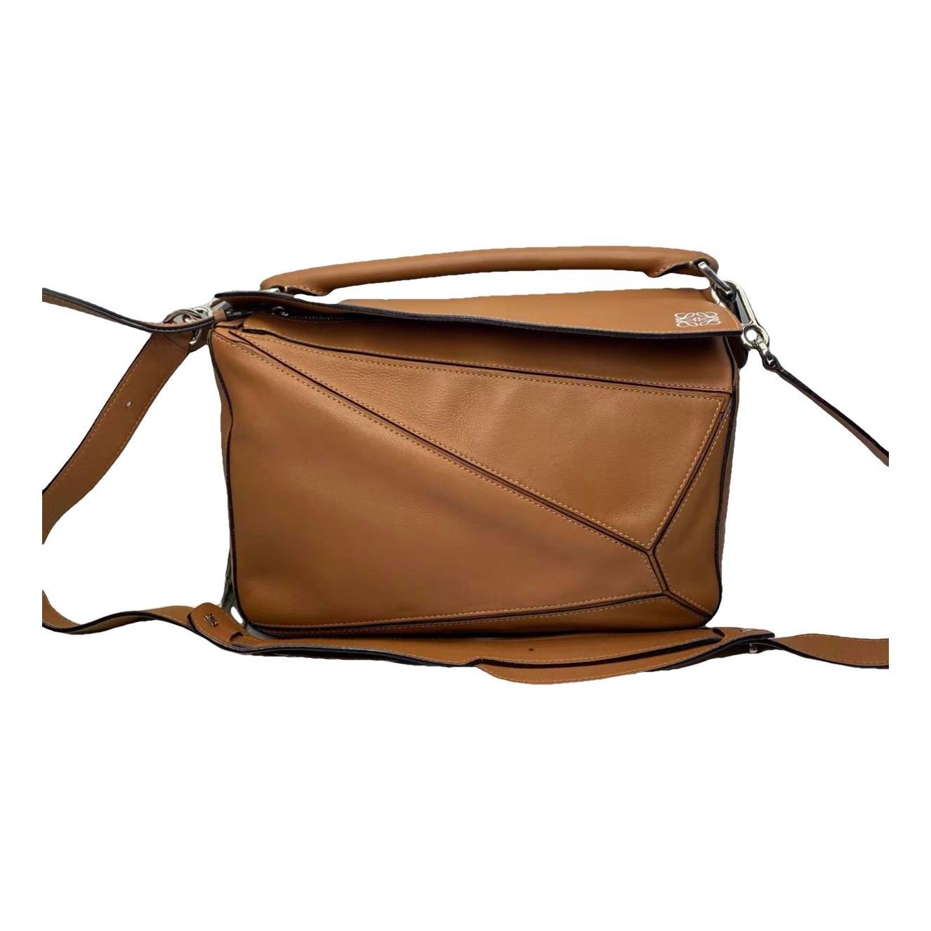Puzzle leather handbag