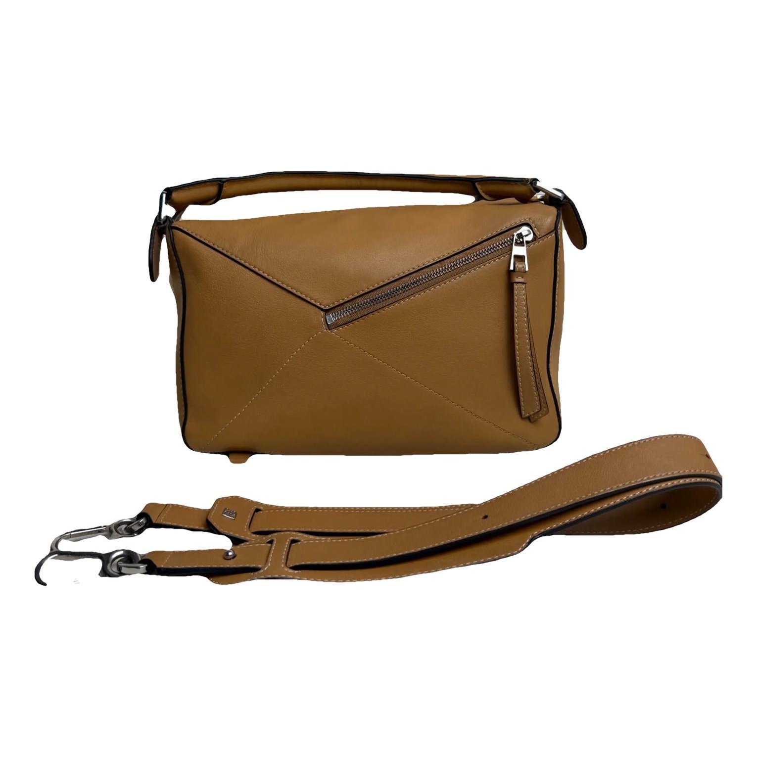 Puzzle leather crossbody bag