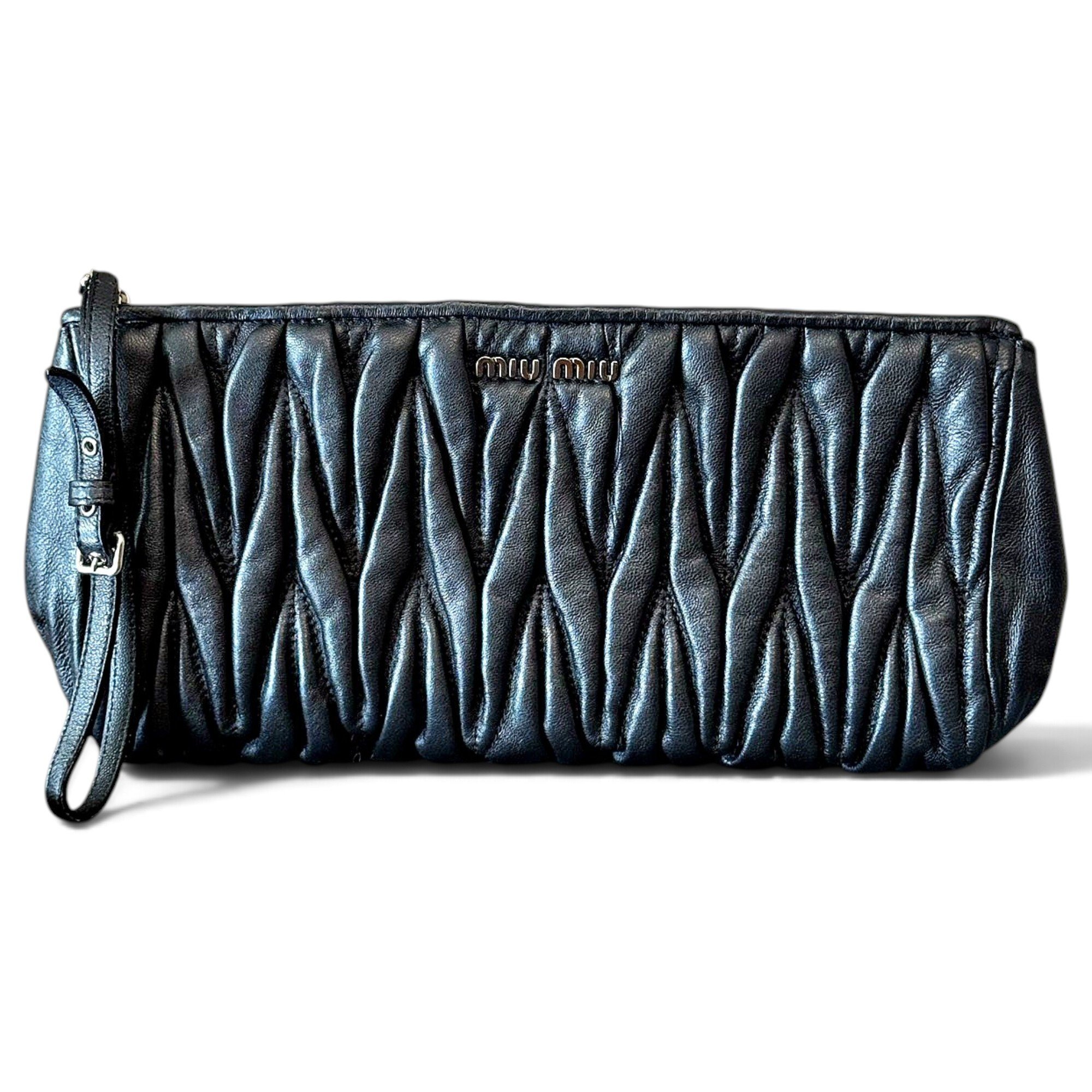 Matelassé leather clutch bag