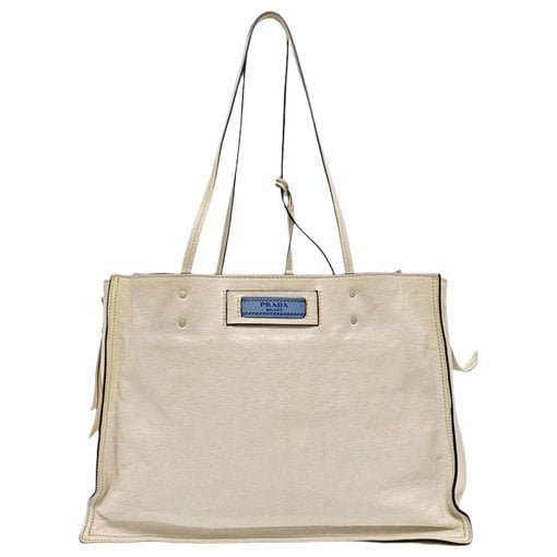 Etiquette leather handbag