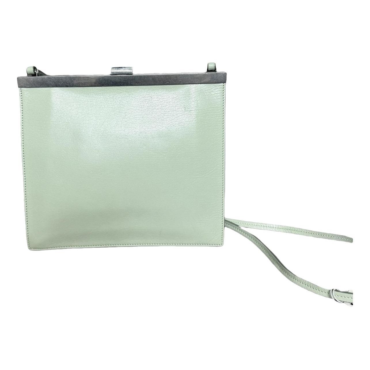 Clasp leather handbag