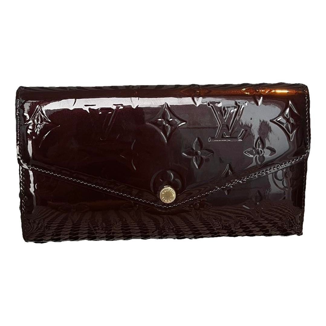 Patent leather clutch bag