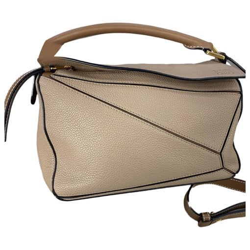 Puzzle leather handbag
