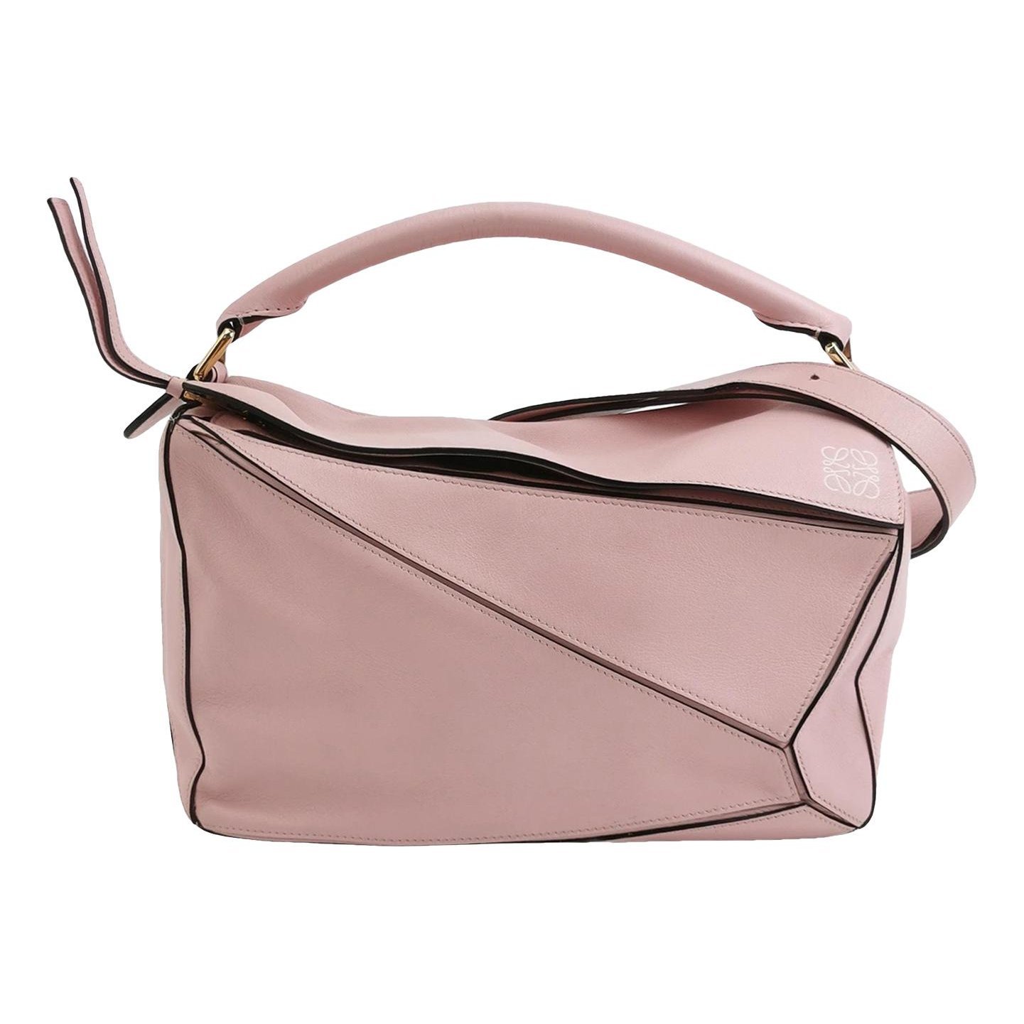 Puzzle leather handbag