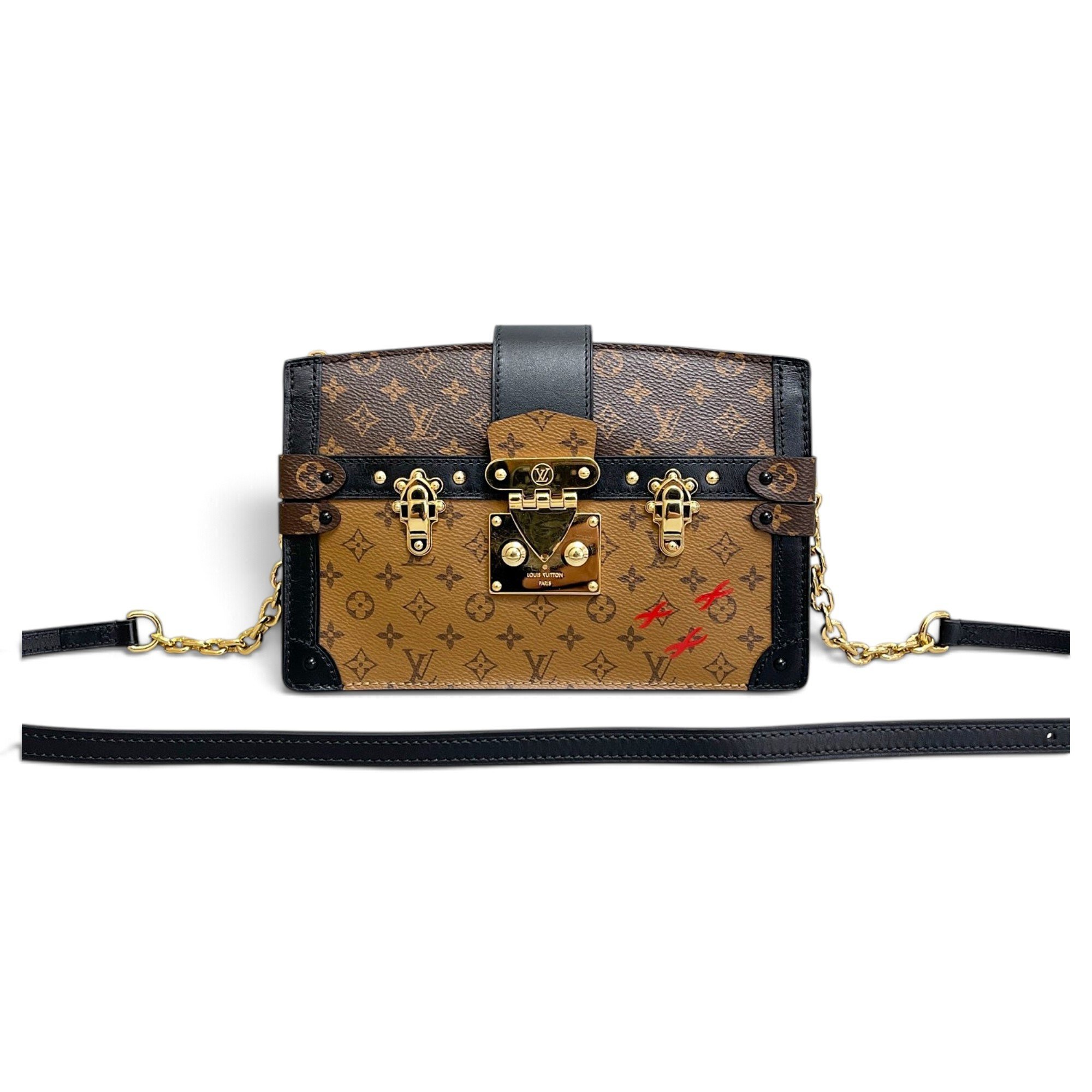 Pochette Trunk leather handbag