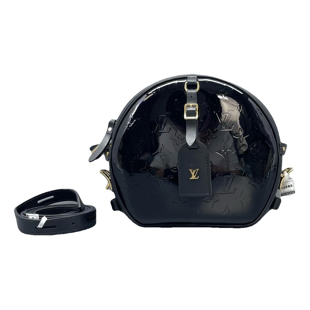 Boîte chapeau souple patent leather handbag
