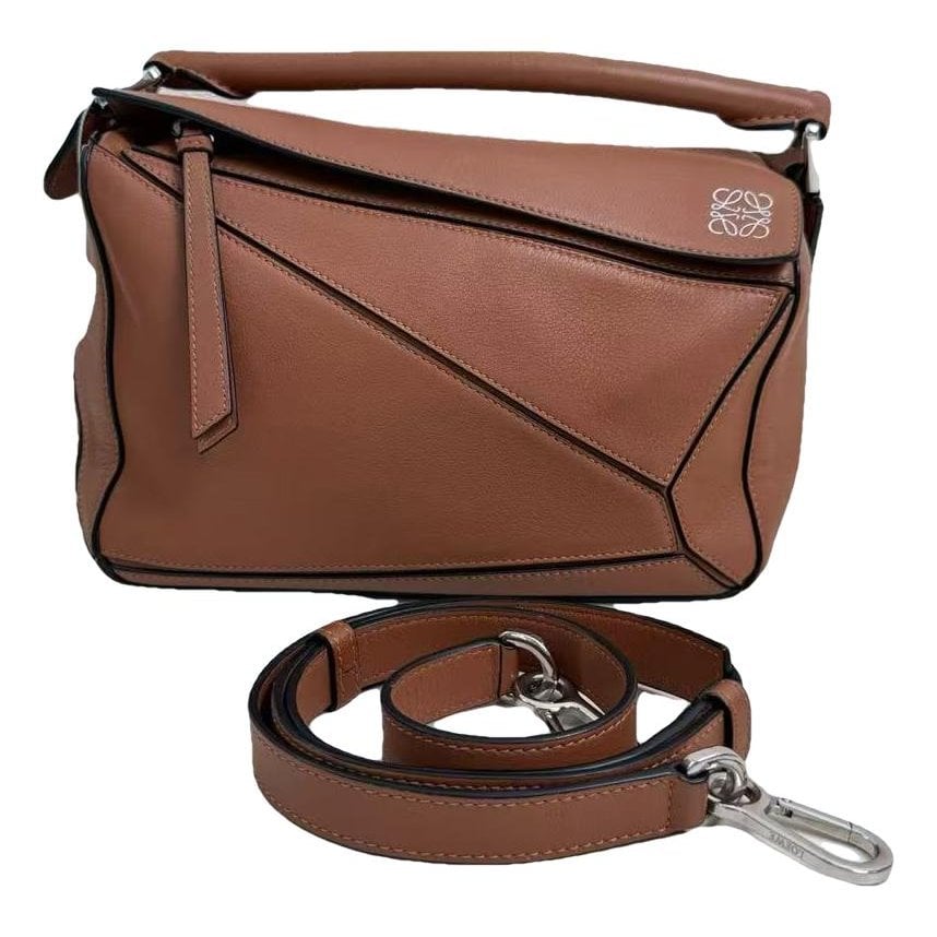 Puzzle leather handbag