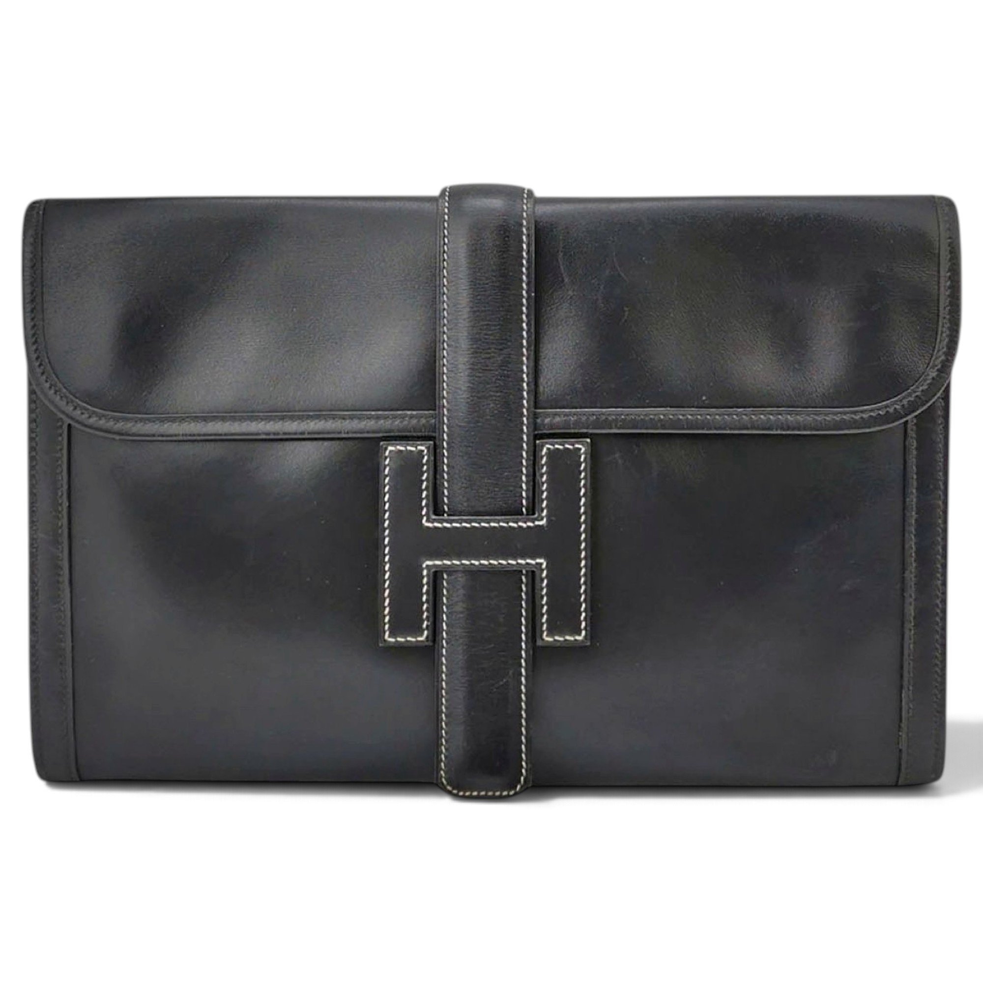 Jige leather clutch bag
