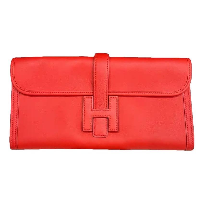 Jige leather clutch bag