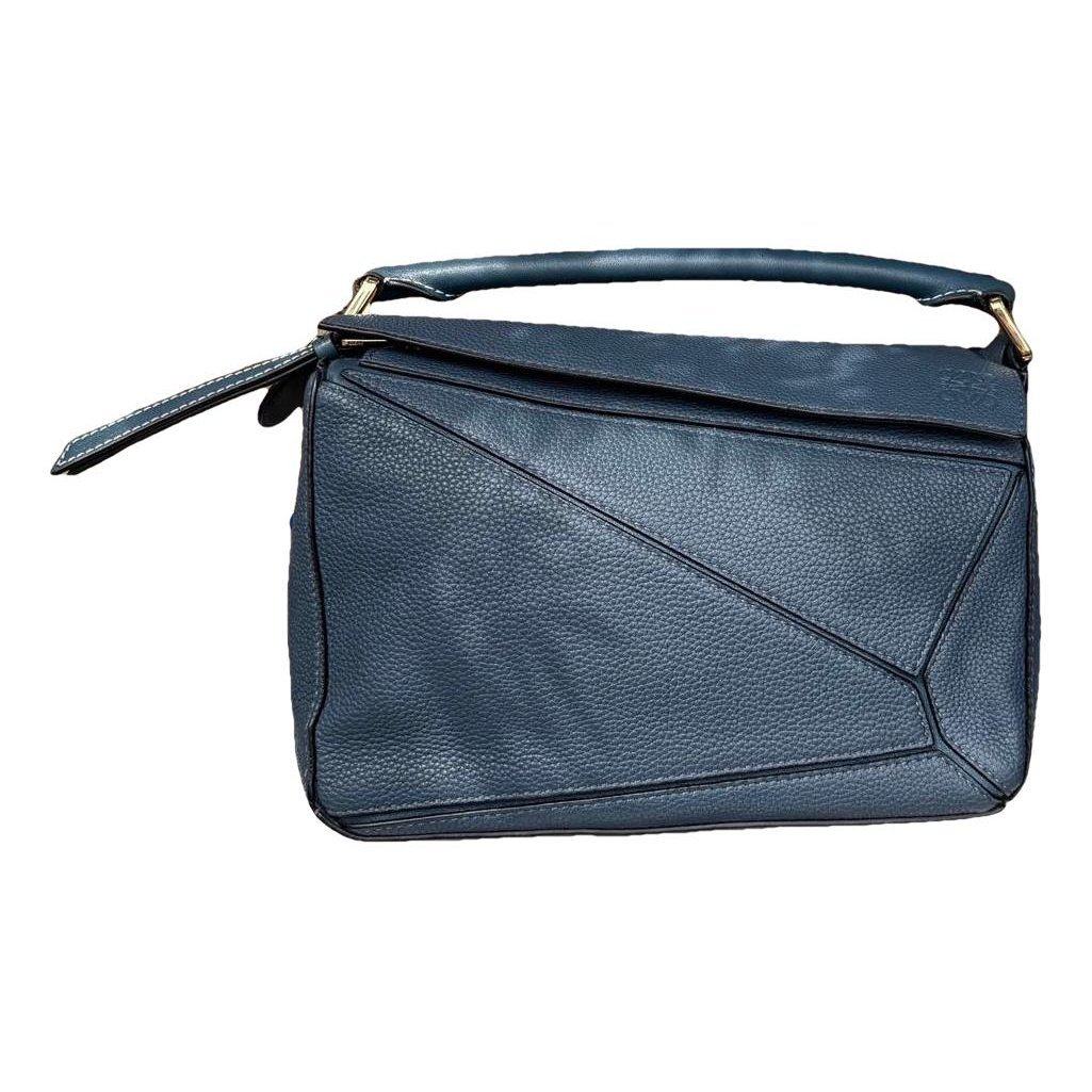 Puzzle leather handbag