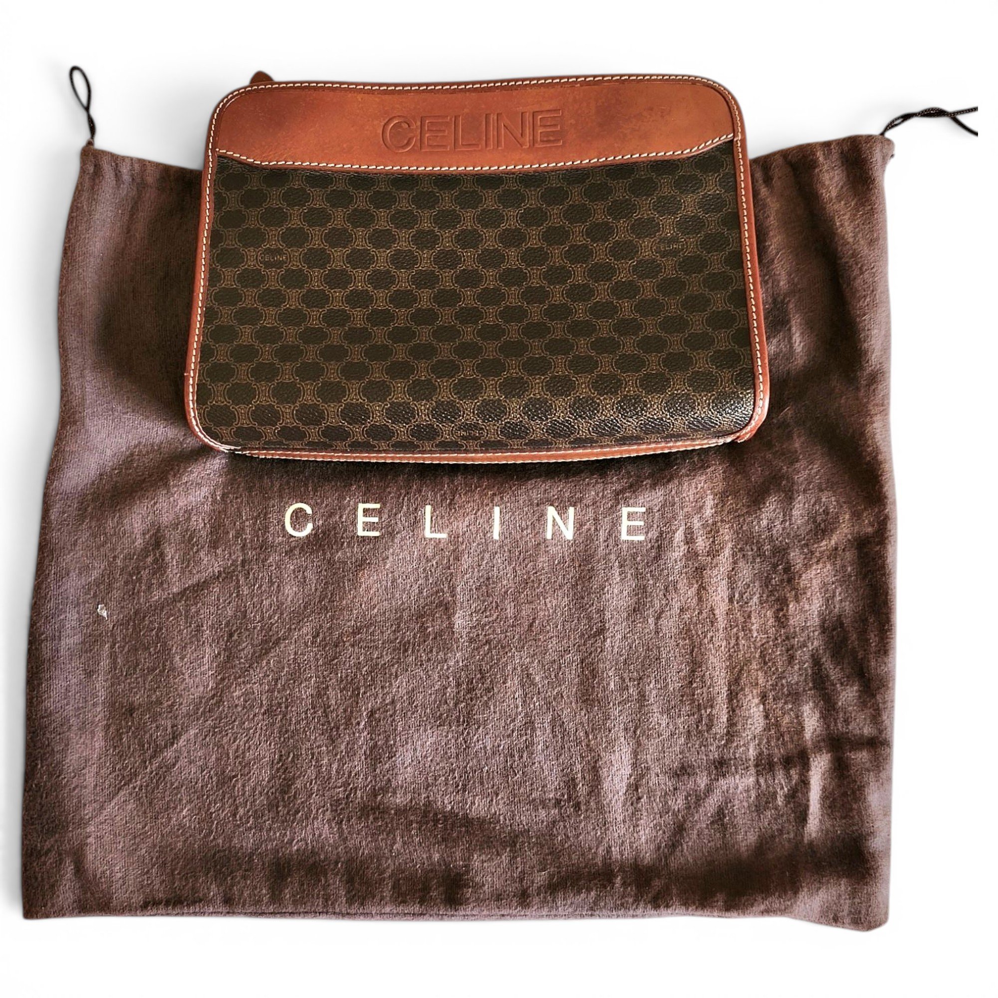 Triomphe Vintage leather clutch bag
