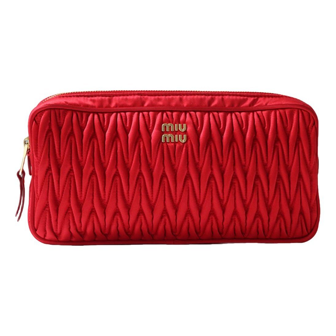 Matelassé leather clutch bag