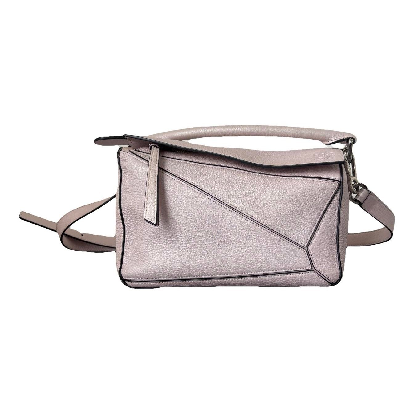 Puzzle leather handbag