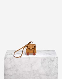 Hermes 
		Kelly Doll Bag Charm Tadelakt / Chevre Mysore Sable Naturel / Nata / Brique / Orange H    