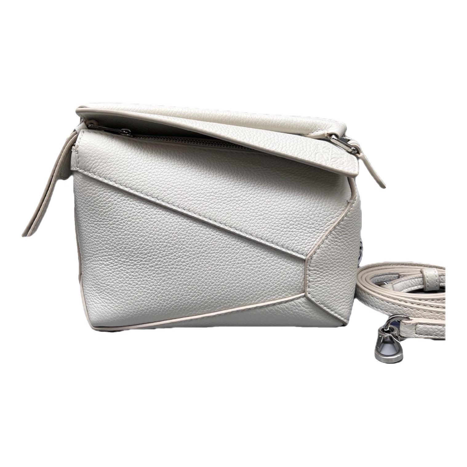 Puzzle leather handbag