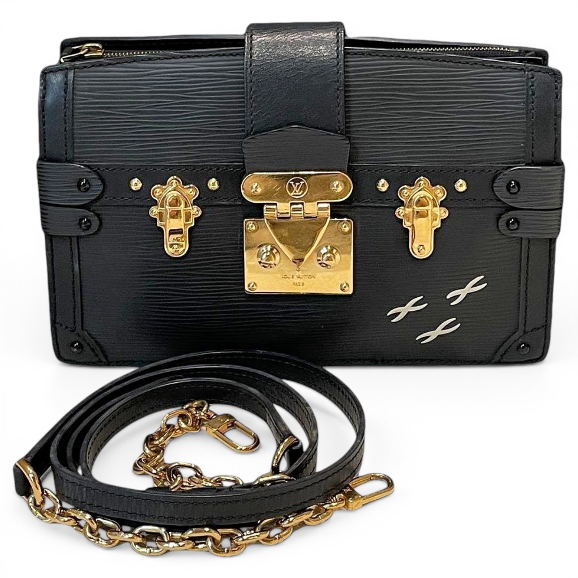 Pochette Trunk leather handbag