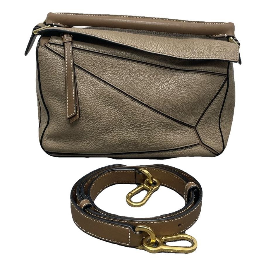 Puzzle leather handbag