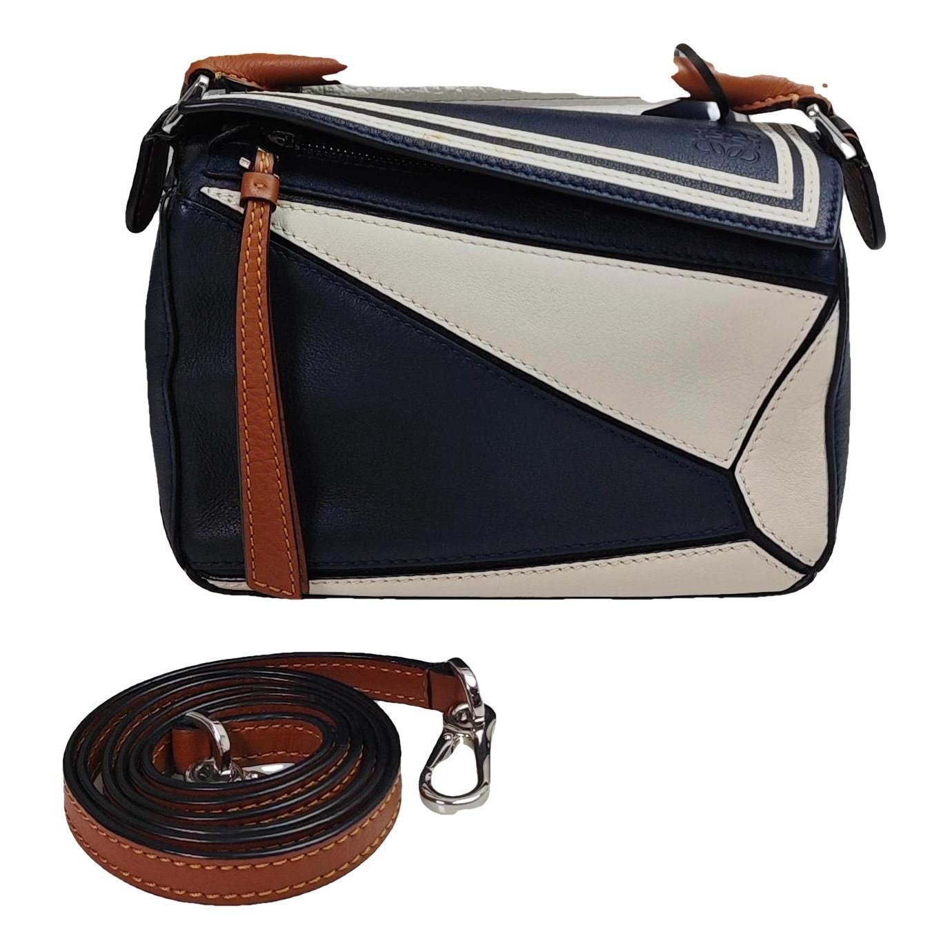 Puzzle leather handbag