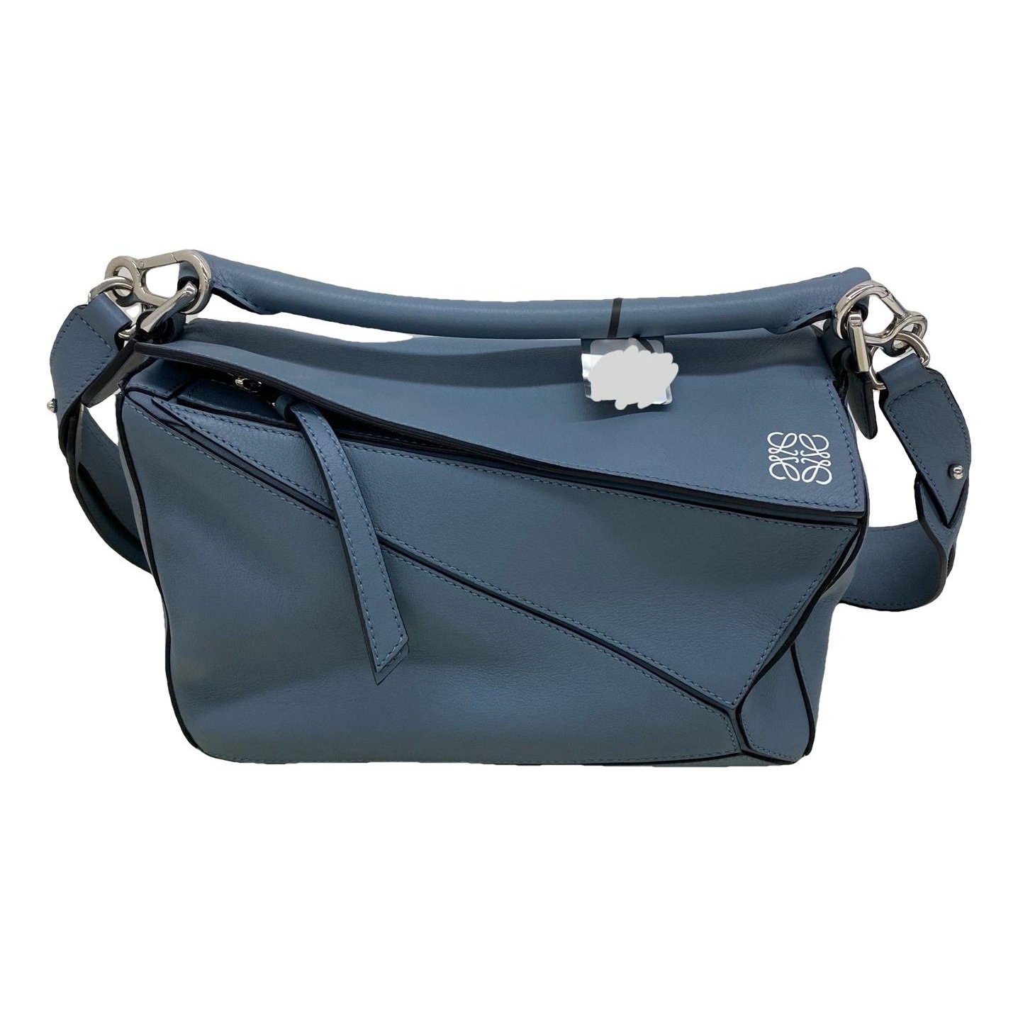 Puzzle leather handbag