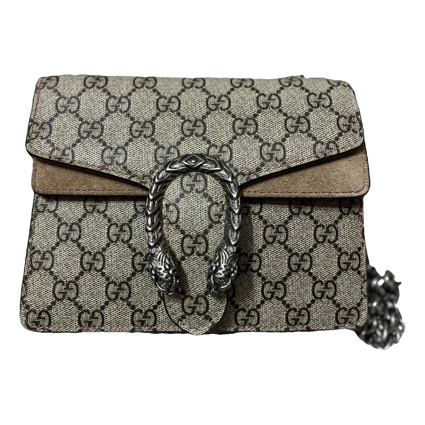 Dionysus clutch bag