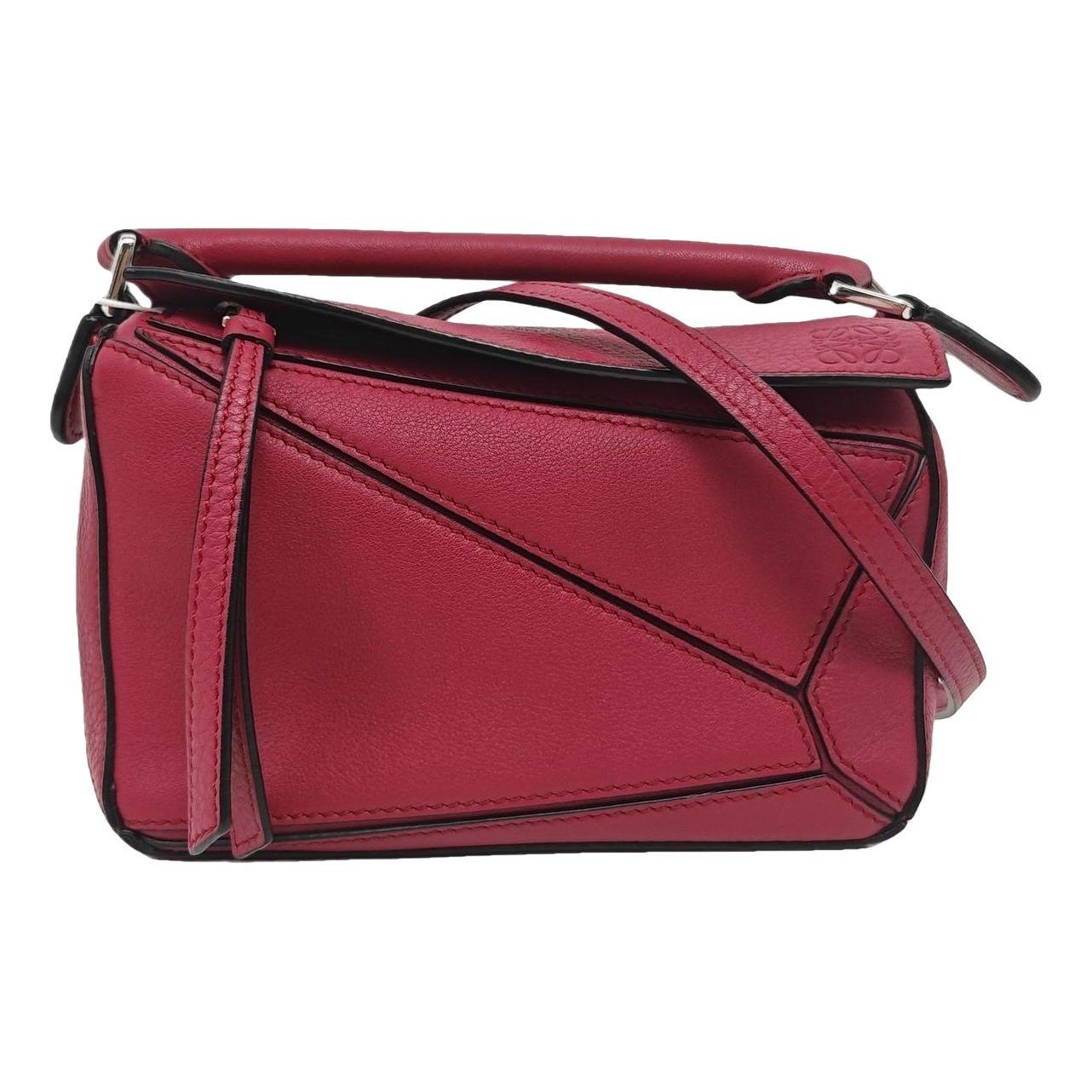 Puzzle leather handbag