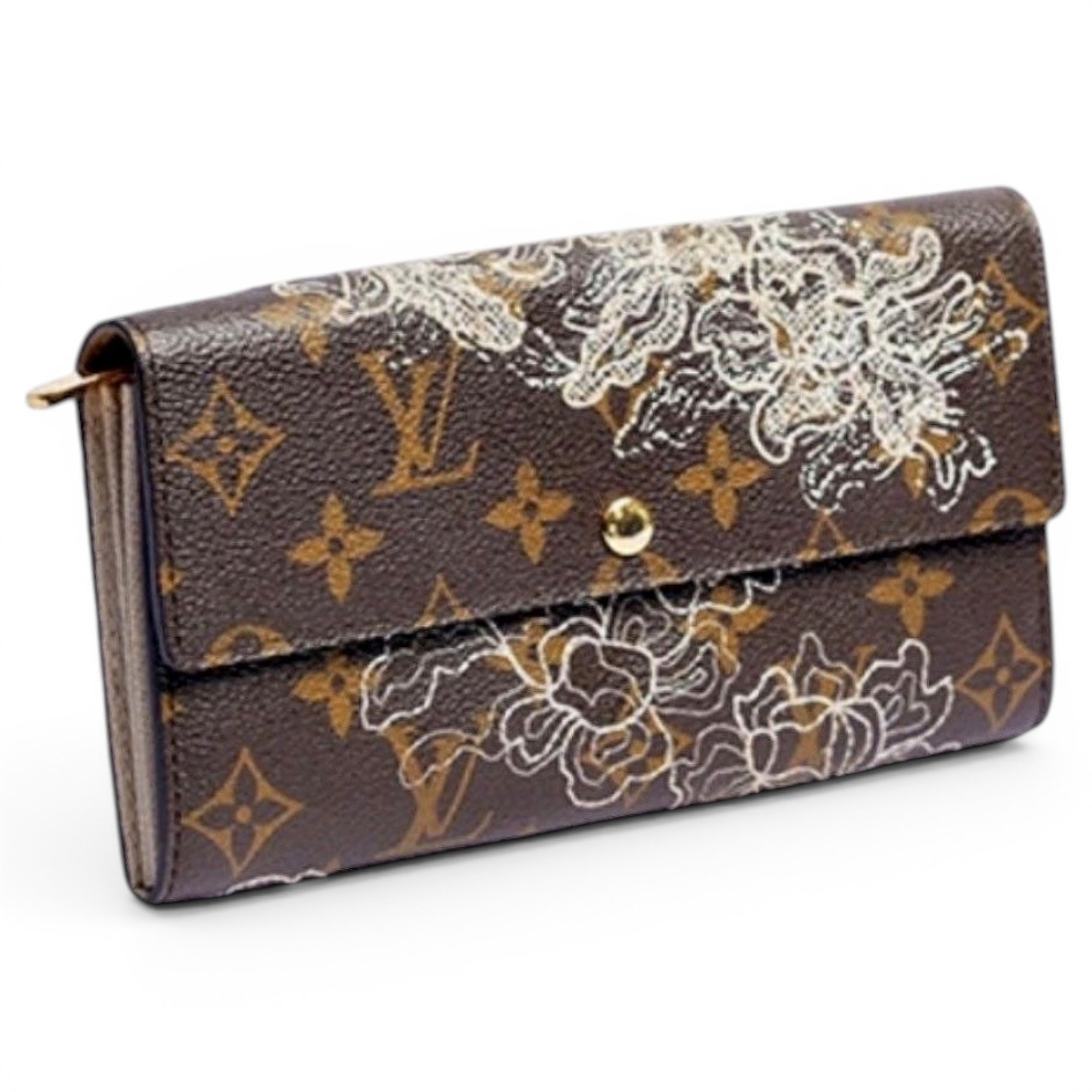 Louis Vuitton Neverfull leather clutch bag