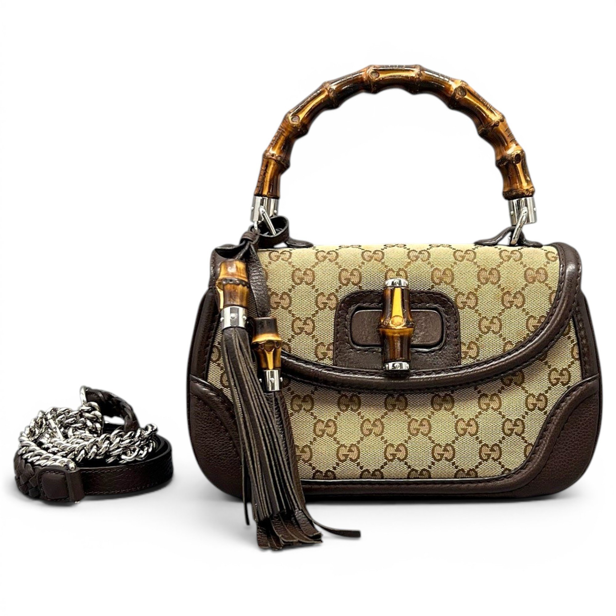 Convertible Pompon Bamboo Top Handle leather handbag