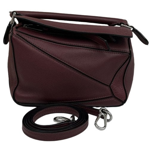 Puzzle leather handbag
