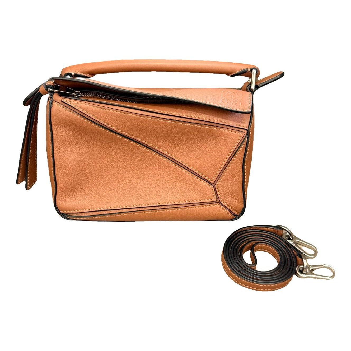 Puzzle leather handbag