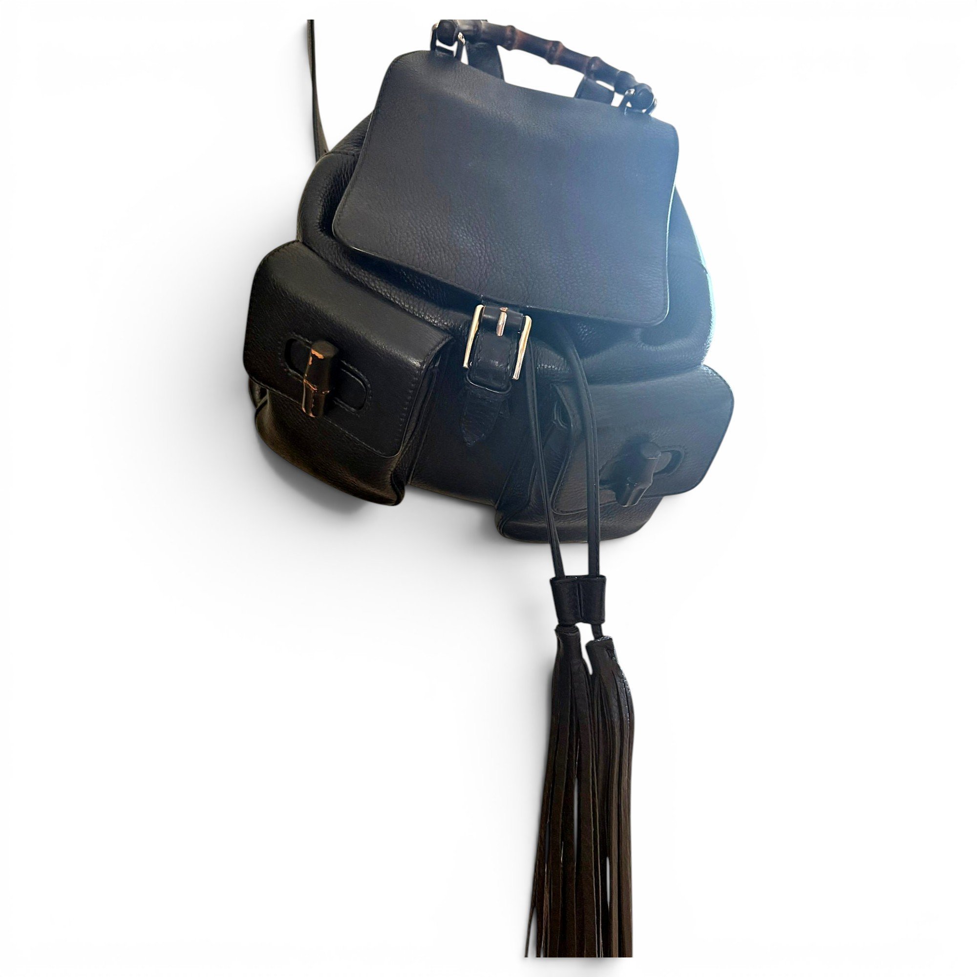 Bamboo Tassel leather backpack