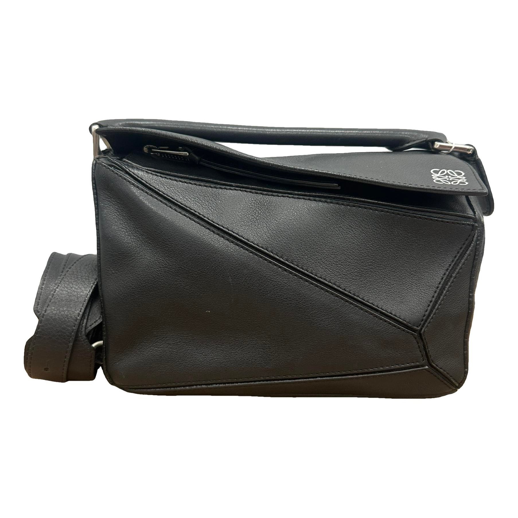 Puzzle leather handbag