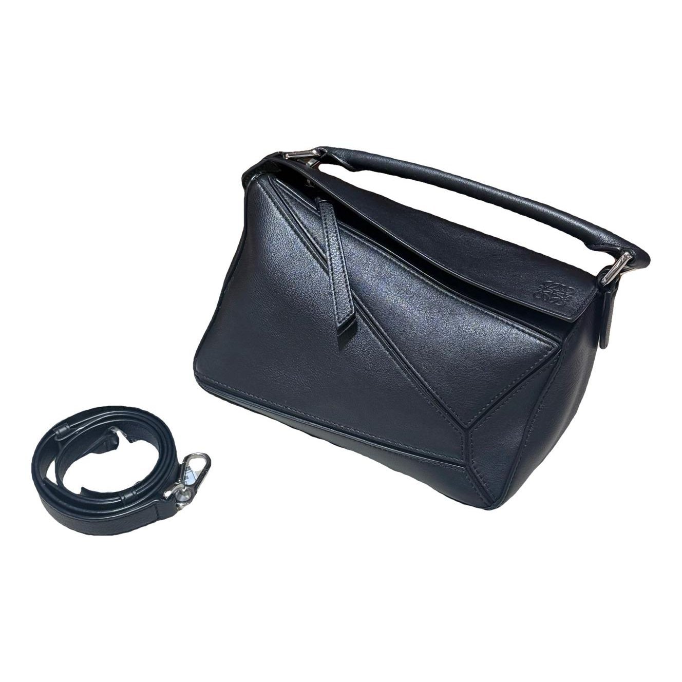 Puzzle leather handbag