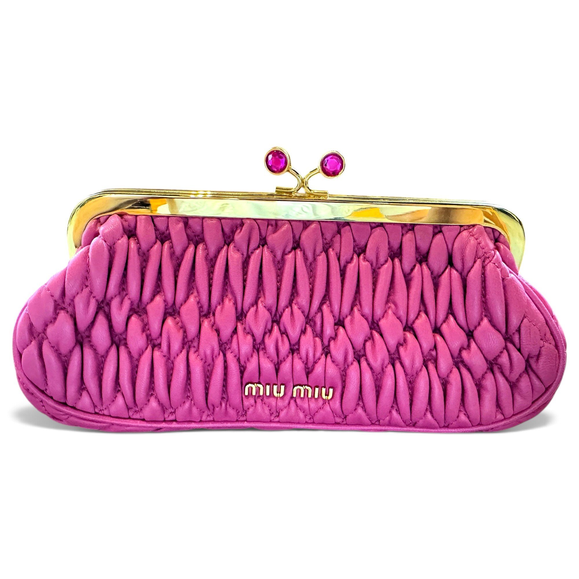 Matelassé leather clutch bag