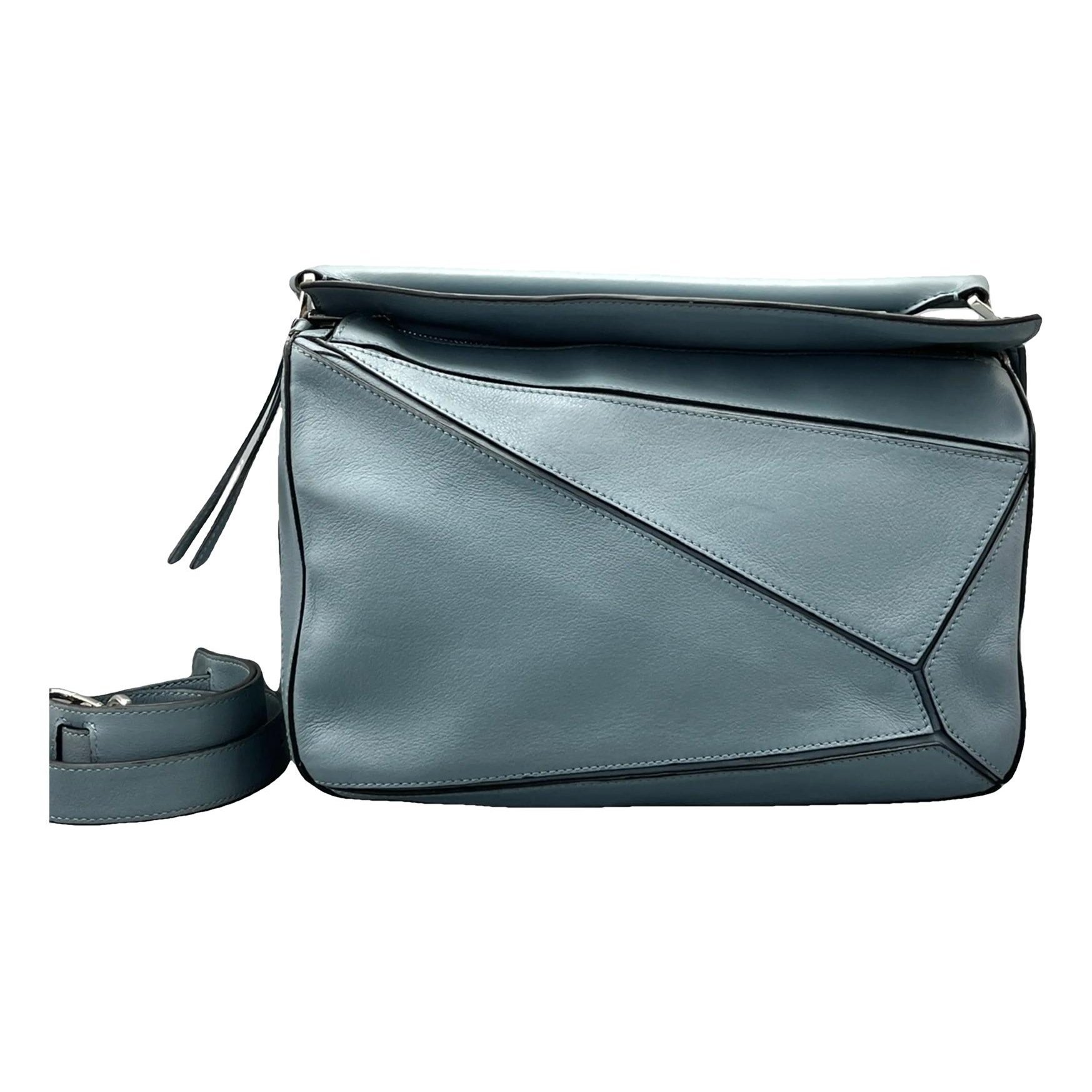 Puzzle leather handbag
