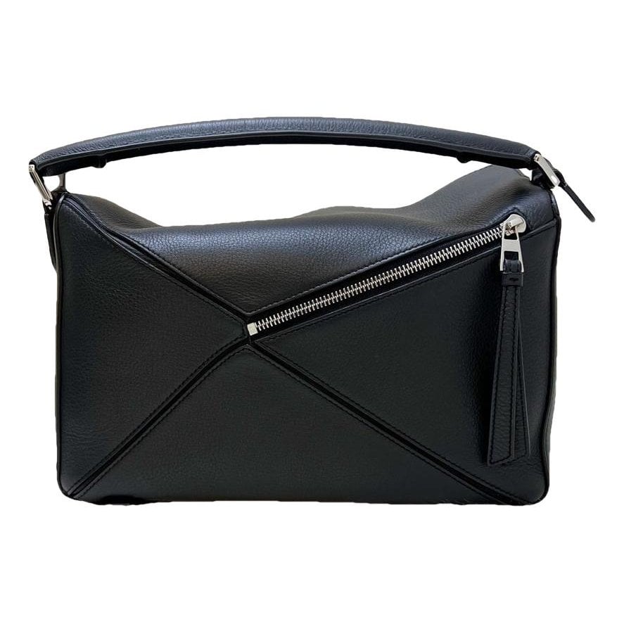 Puzzle leather handbag